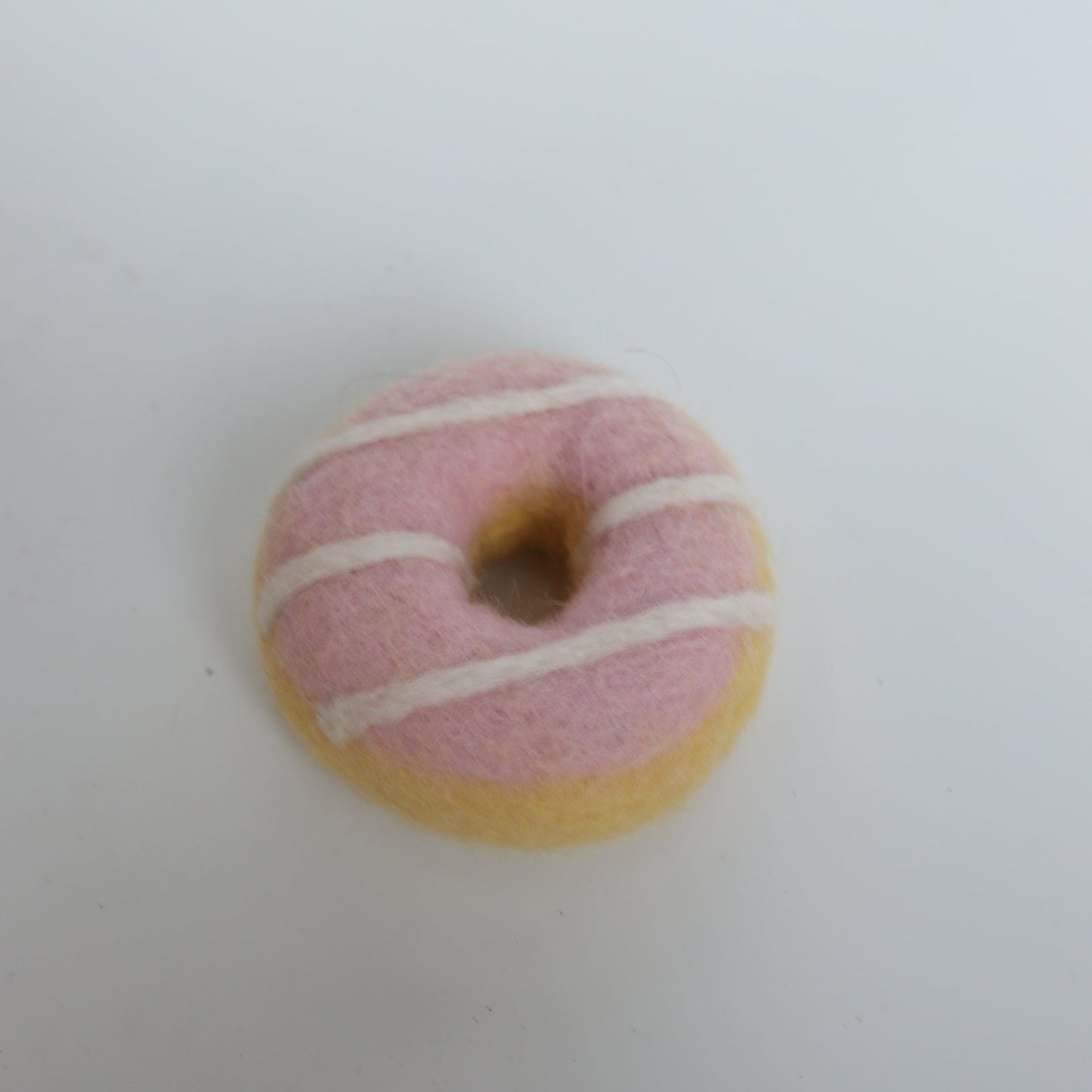 Pink drizzle donut