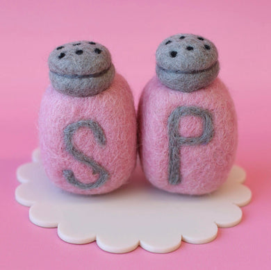 Pink salt and pepper shakers